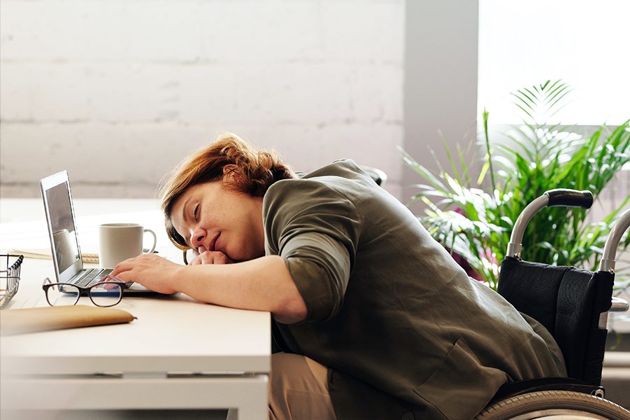 Lady sleeping on desk