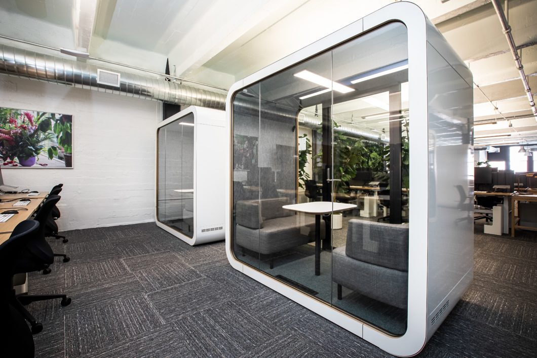 Image of working pods in an office.